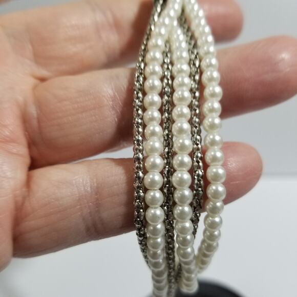 Two bracelets one copper colored bangle one multi chain faux - Picture 6 of 13